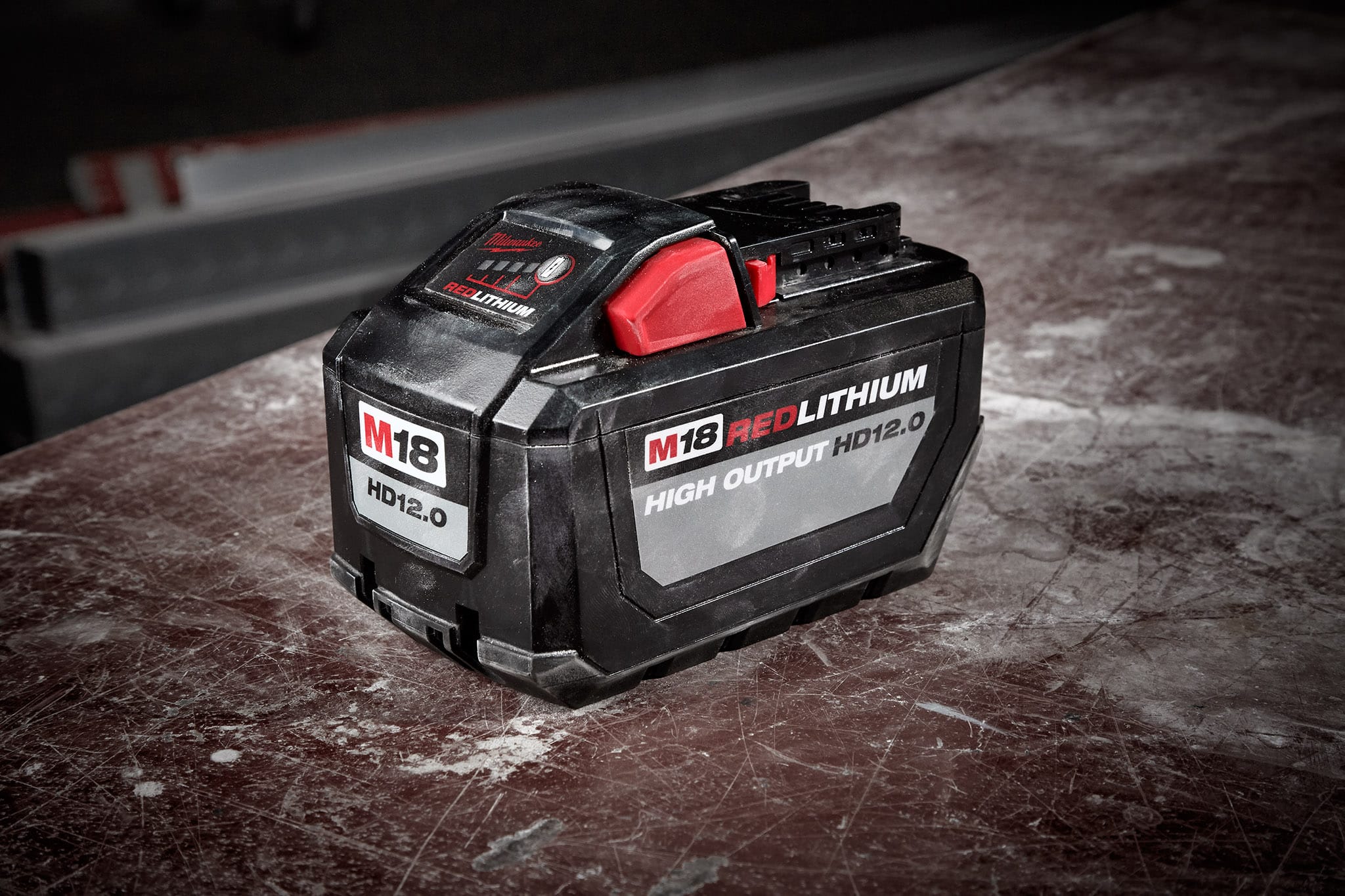 M18 12AH Battery on a concrete slab